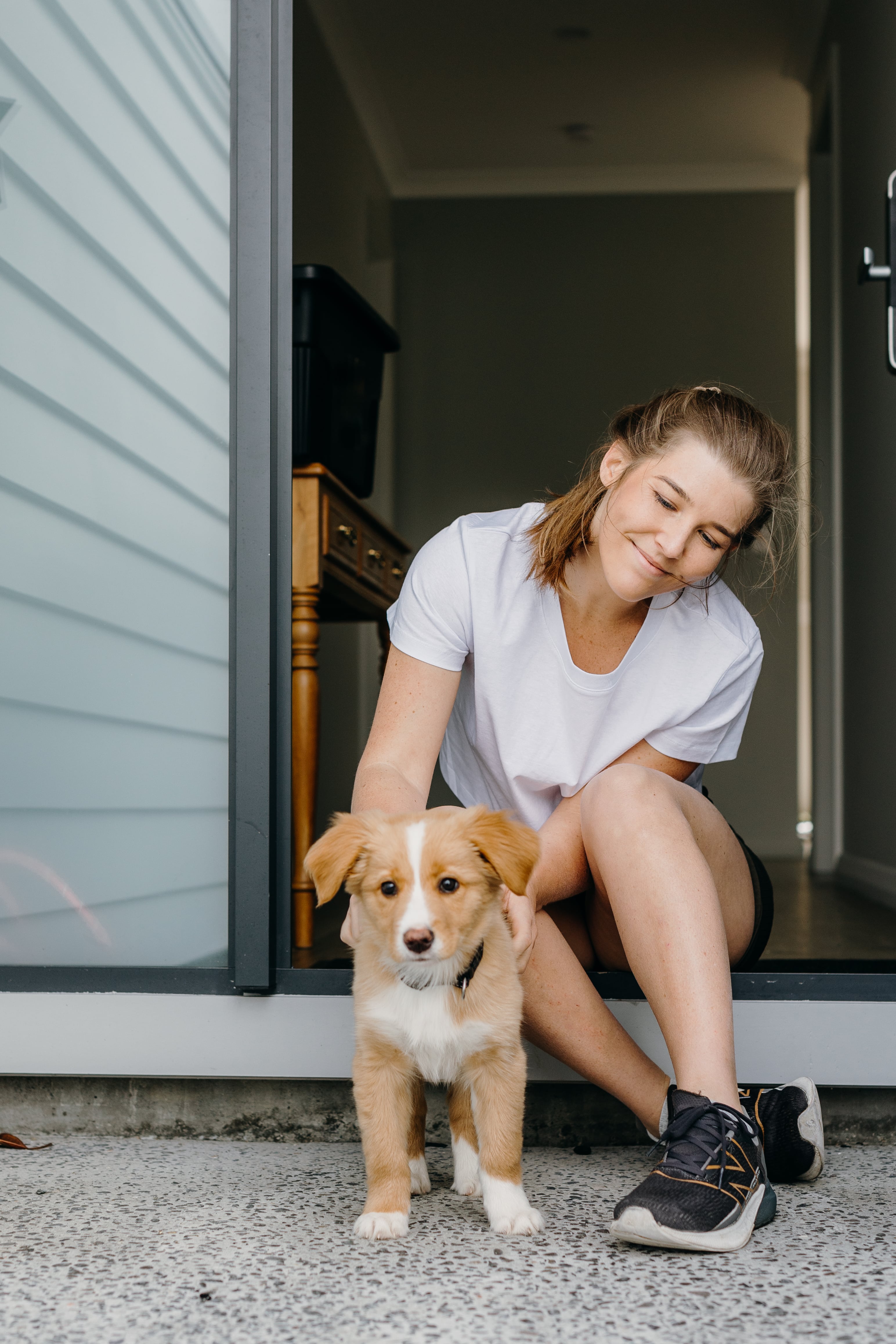 Woman bonding with her dog | Fearless Nutrition
